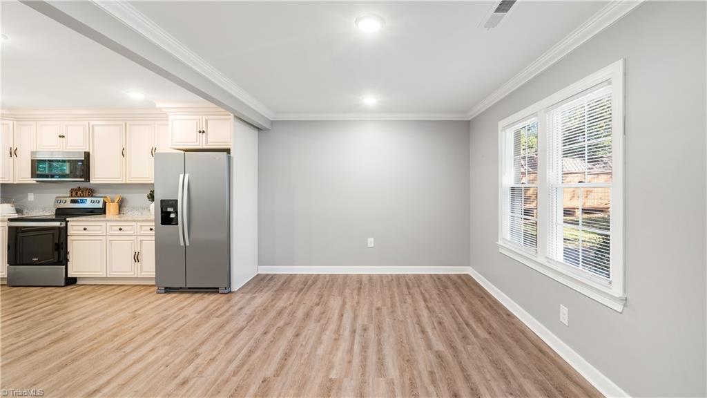 Photo 4 of Single family home for sale at 5040 Wind Spring Dr, Winston Salem, NC 27105 | MLS# 1238294 | Listing updated on 2026-10-09