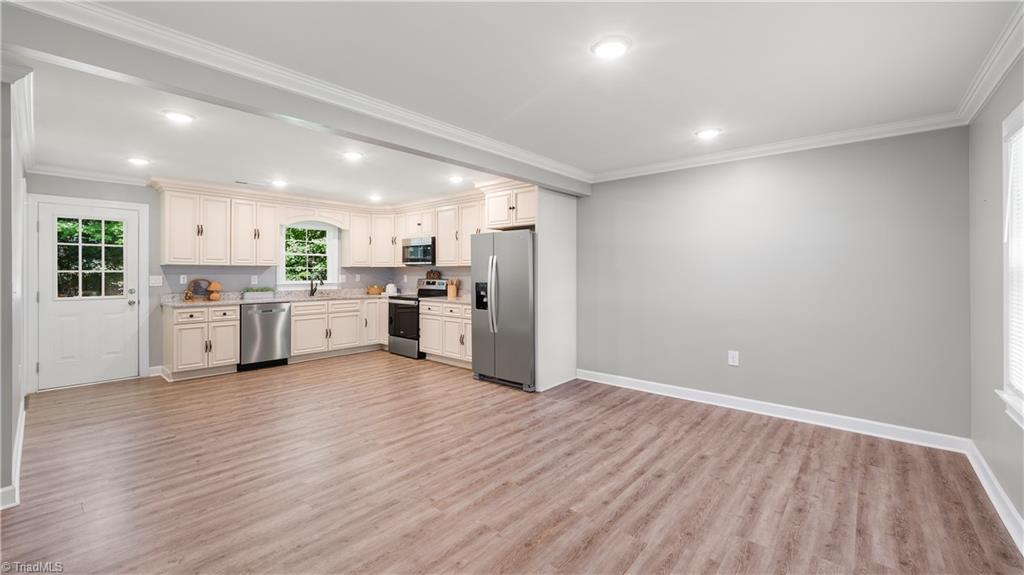 Photo 3 of Single family home for sale at 5040 Wind Spring Dr, Winston Salem, NC 27105 | MLS# 1238294 | Listing updated on 2026-10-09