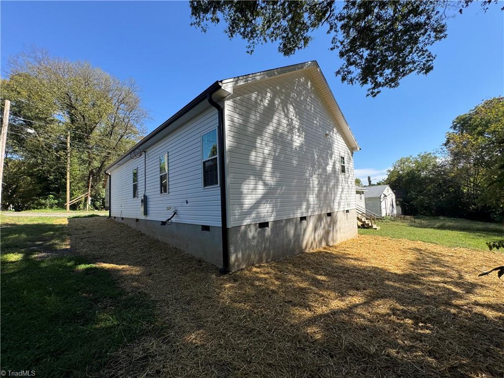 Photo 2 of Single family home for sale at 305 E 5th Avenue, Lexington, NC 27292 | MLS# 1238388 | Listing updated on 2026-10-08