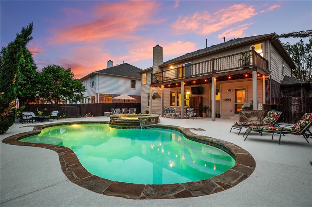 A custom pool and spa await you in this backyard oasis!