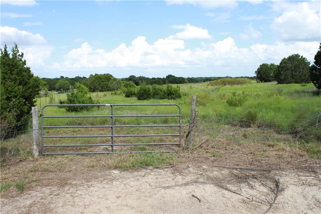 Entry to property at end of N. San Gabriel Loop - has water/electric available