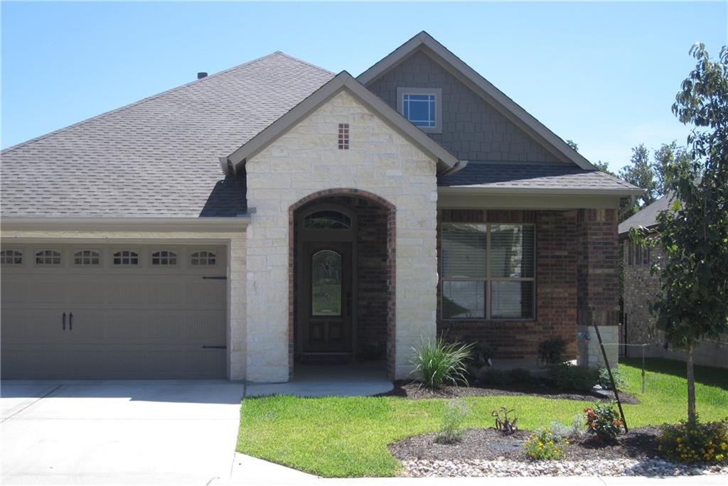 Great one story with covered front porch in gated community.