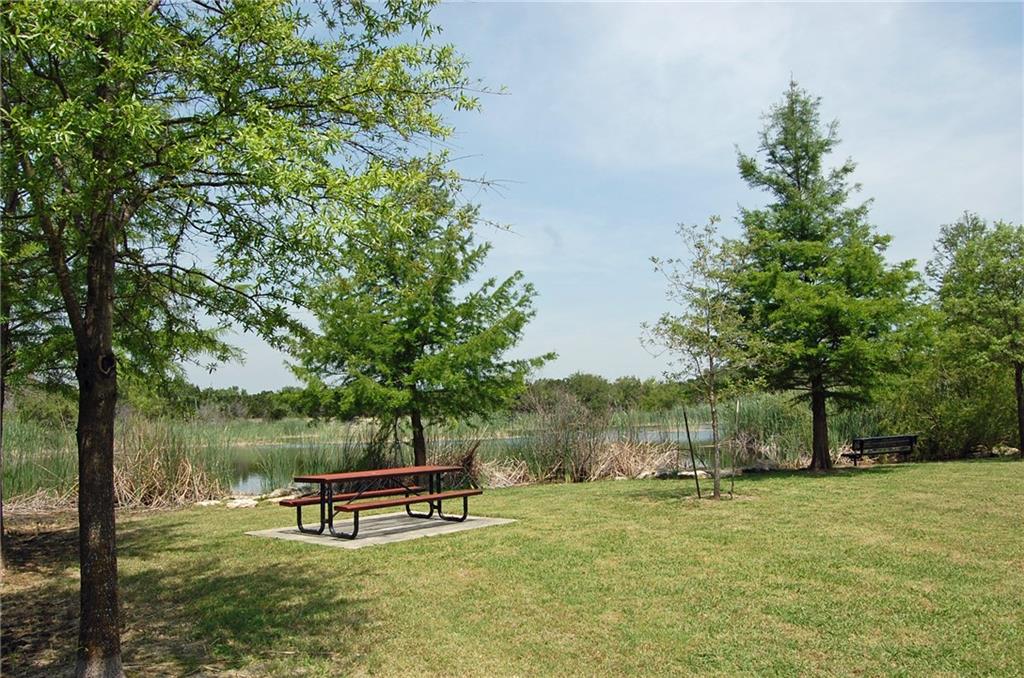 Beautiful Quarry Lake is located just behind your home where you can jog, fish, picnic, but best of all, no neighbors behind you.