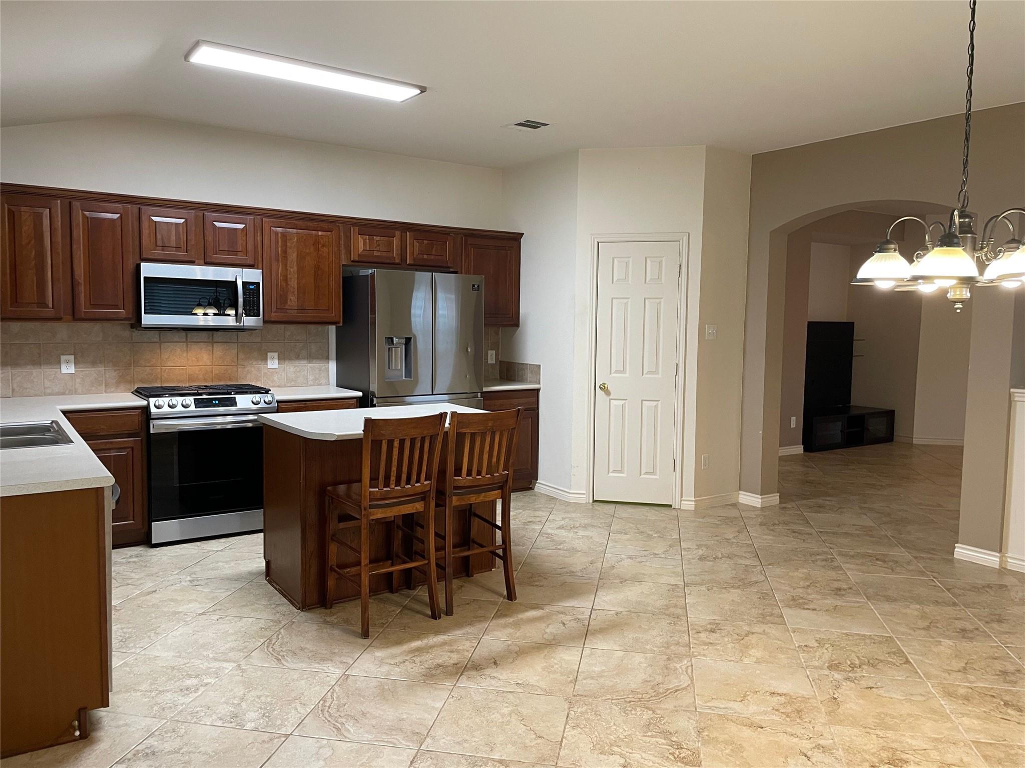 Kitchen has Stainless Appliances