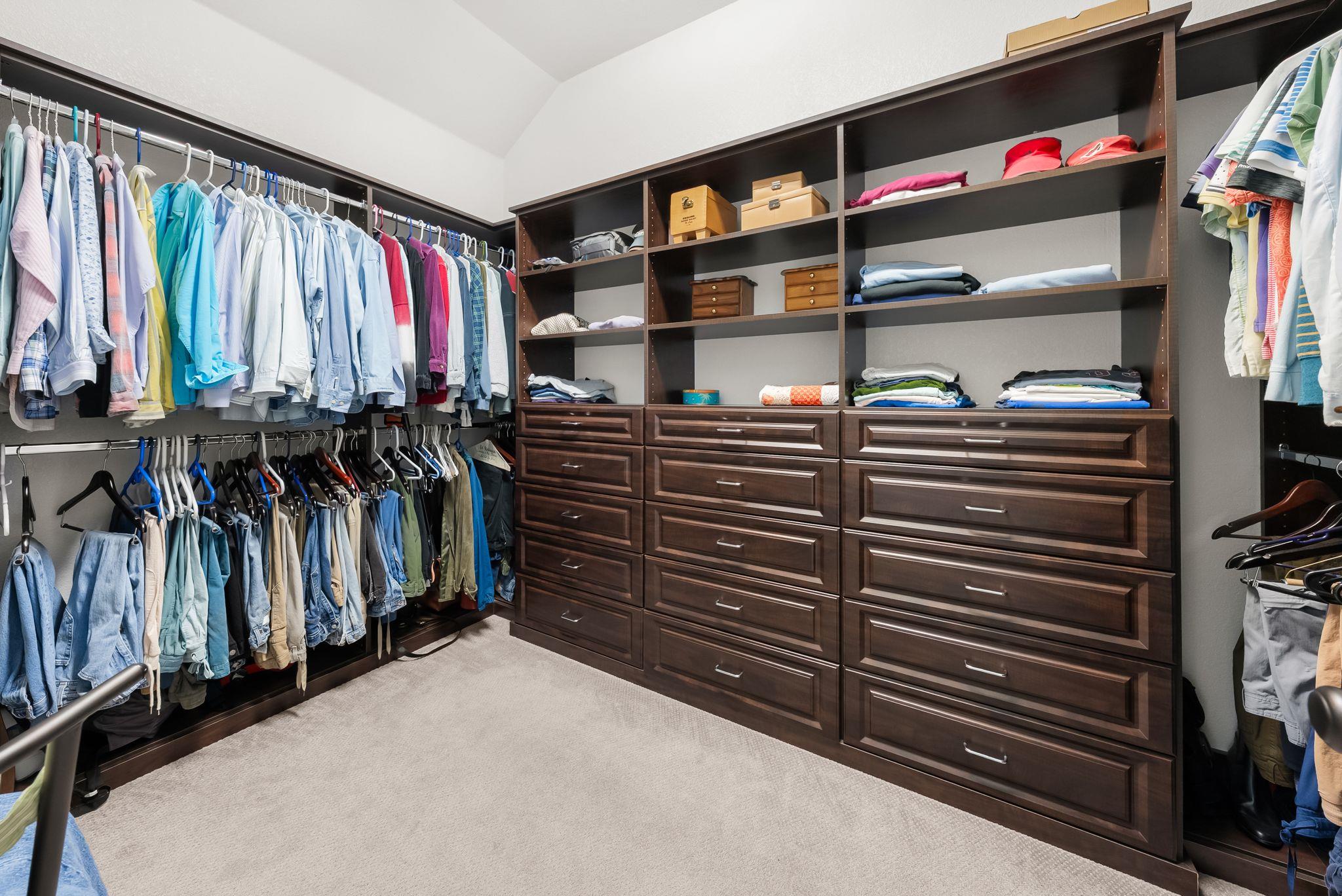 Custom closet in primary bedroom