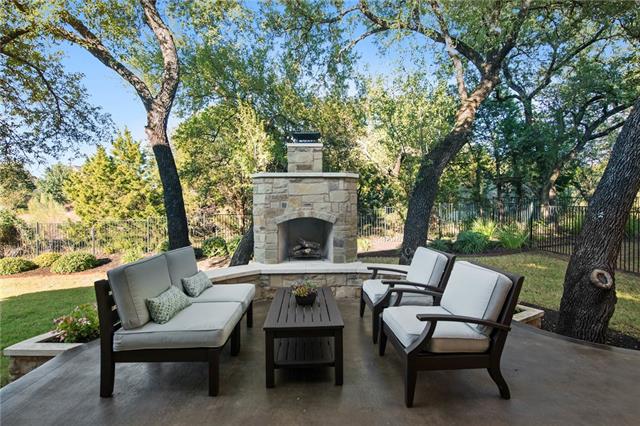 Strategically nestled in the oaks, this outdoor oasis is the ideal location to relax and unwind after a long day.