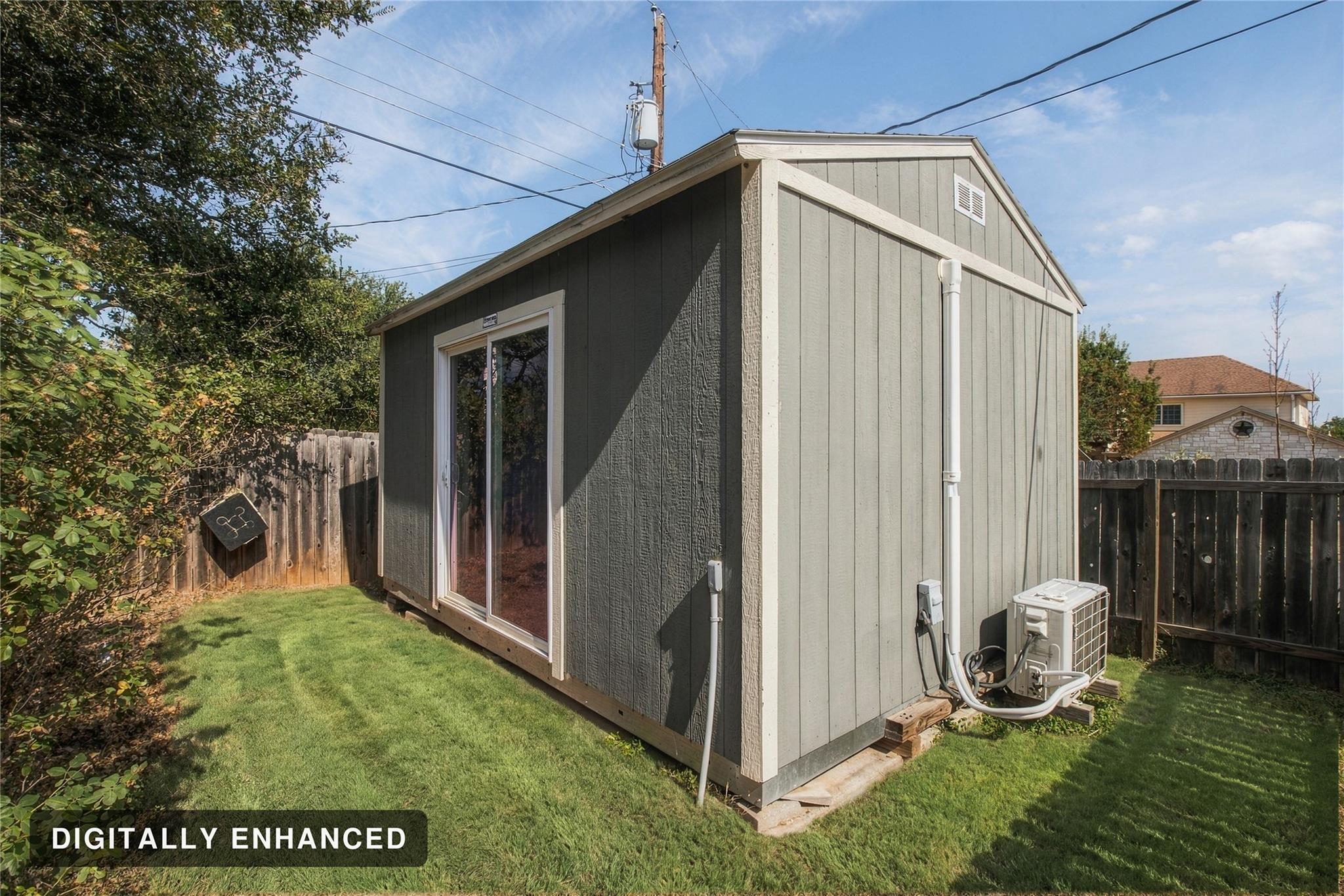 192 SF insulated, air-conditioned building with electricity and cable wiring—ideal for a private office, gym, studio or hobby space.