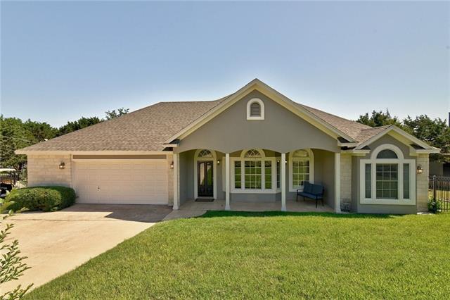 White limestone and freshly painted stucco exterior