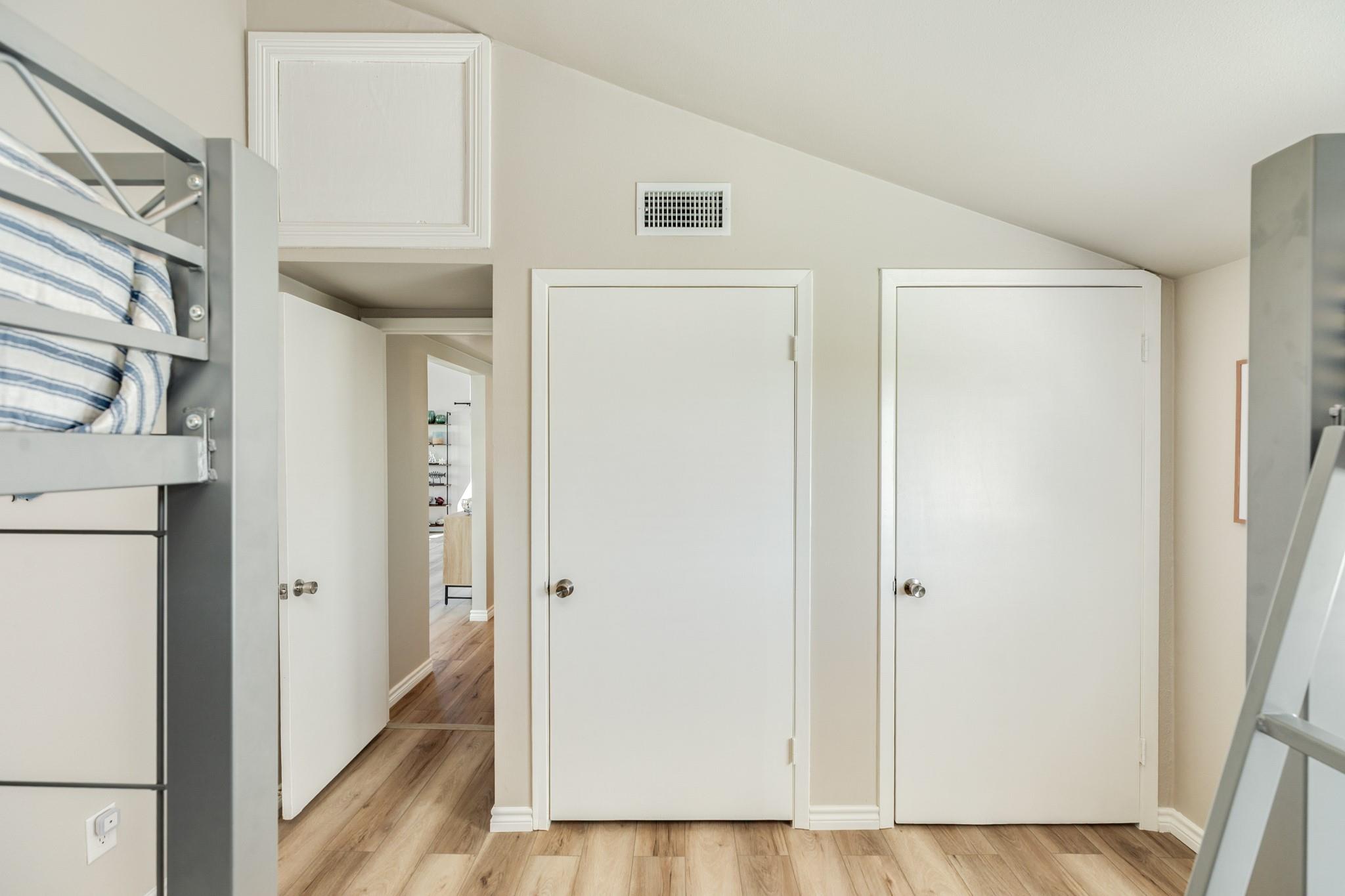 Bunk Room – Efficient layout with built-in bunk beds and easy access to storage and adjacent living areas.