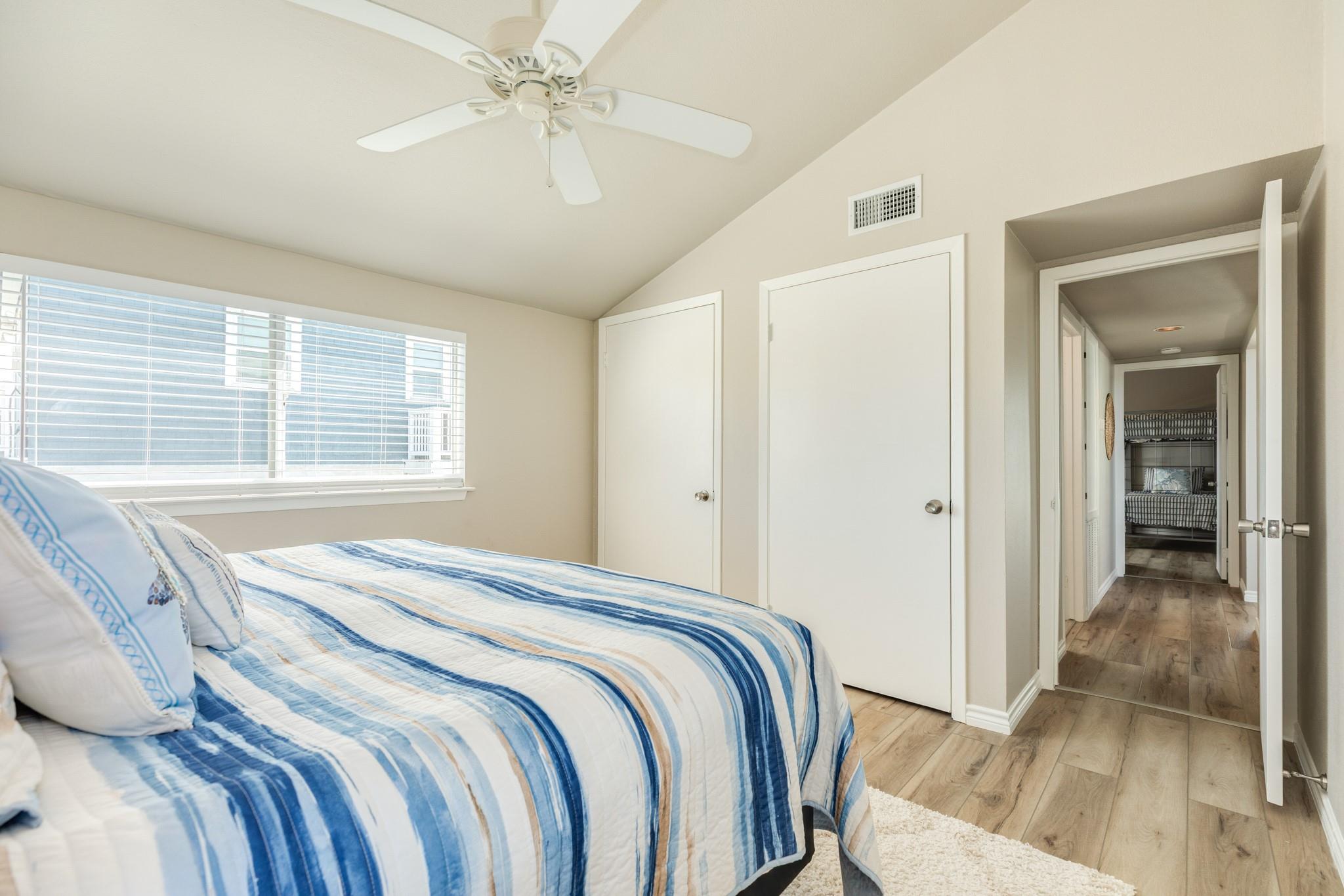 Bedroom – Well-sized layout with convenient access to nearby closets and hallway, perfect for guests or everyday living.