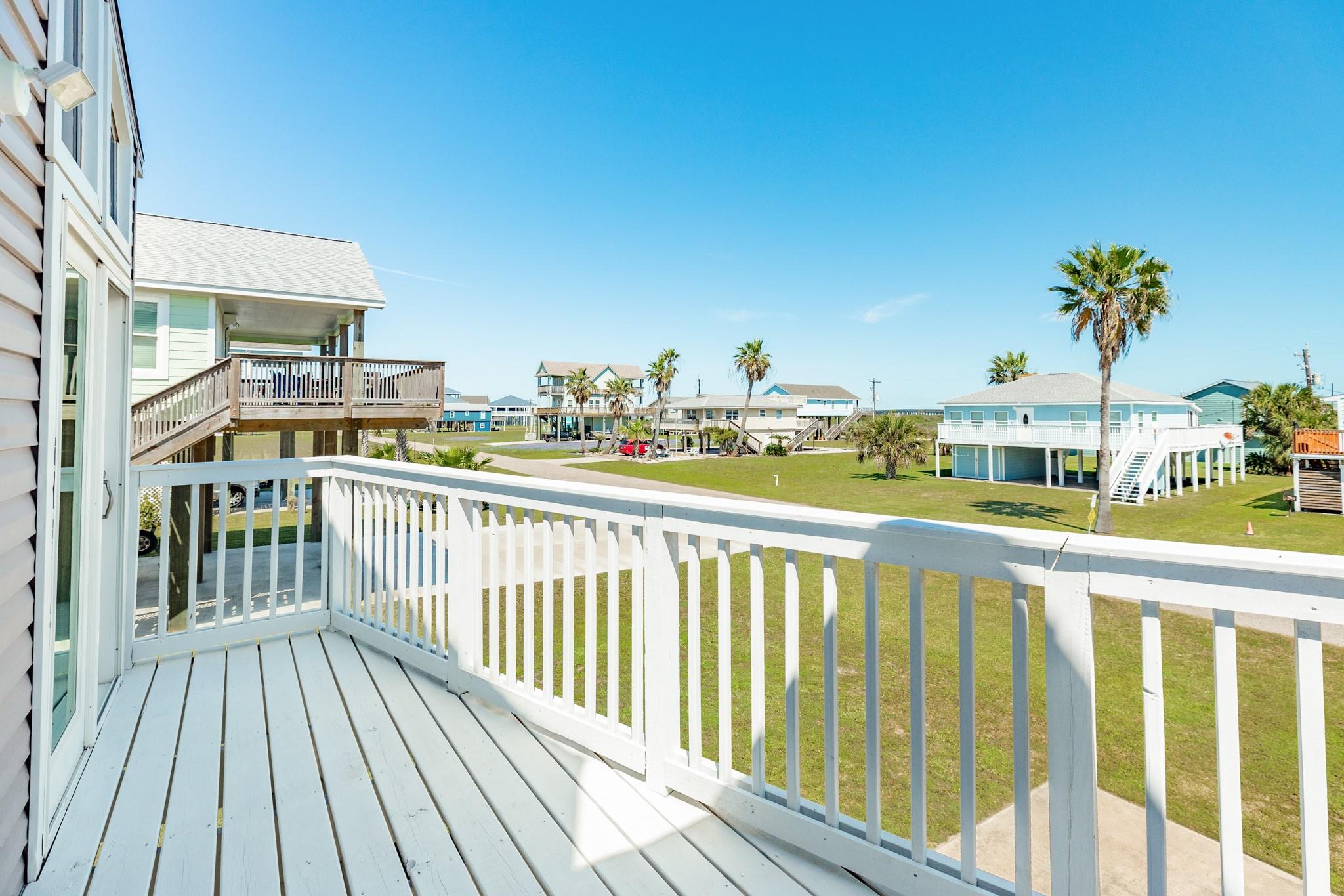 Deck View – Elevated deck overlooks the surrounding neighborhood, offering open views and a breezy outdoor retreat.