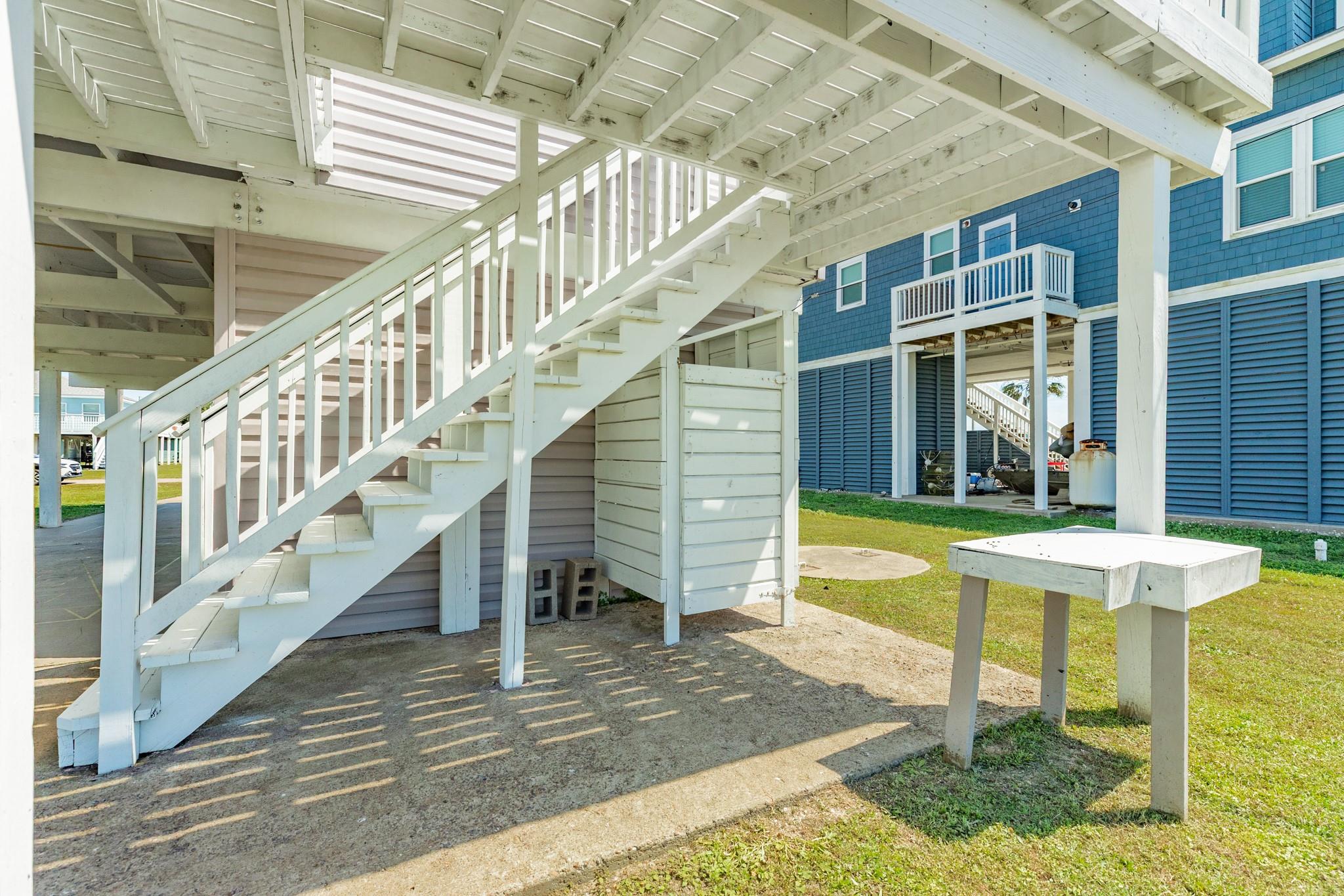 Under-Home Utility Area – Functional space with easy access to utilities and additional room for storage or workspace needs.