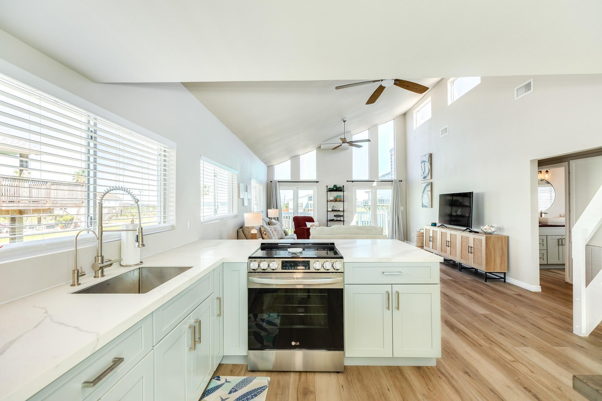 Kitchen with Living View – Open kitchen design overlooks the living area, making it easy to stay connected while cooking or hosting.