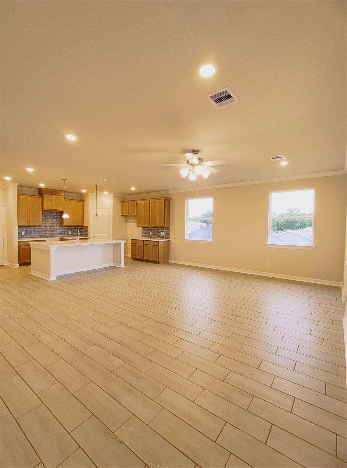 . Shaw Wood plank Ceramic tile in all rooms except bedrooms.