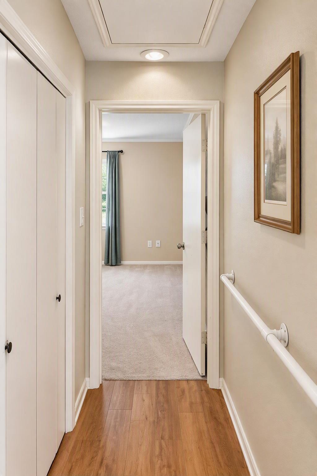 Primary hall features the utility room big enough for full sized Washer and Dryer