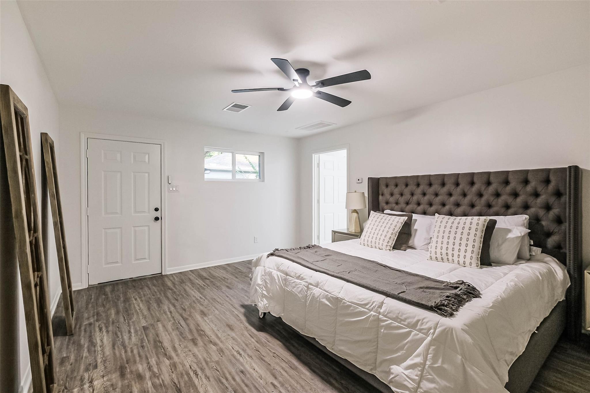 1st floor bedroom - ADA compliant. Also has a door directly out to the back yard and patio area.