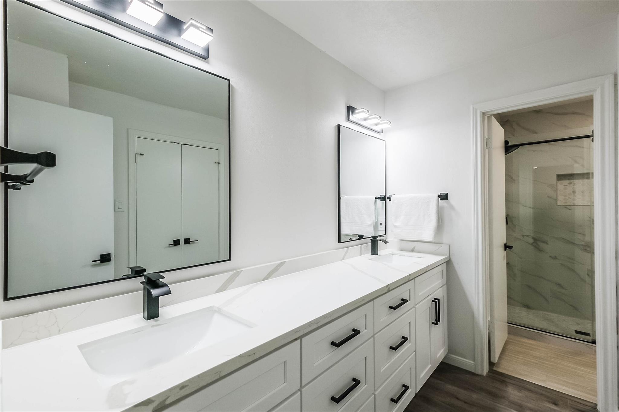 The primary bathroom has been totally renovated.