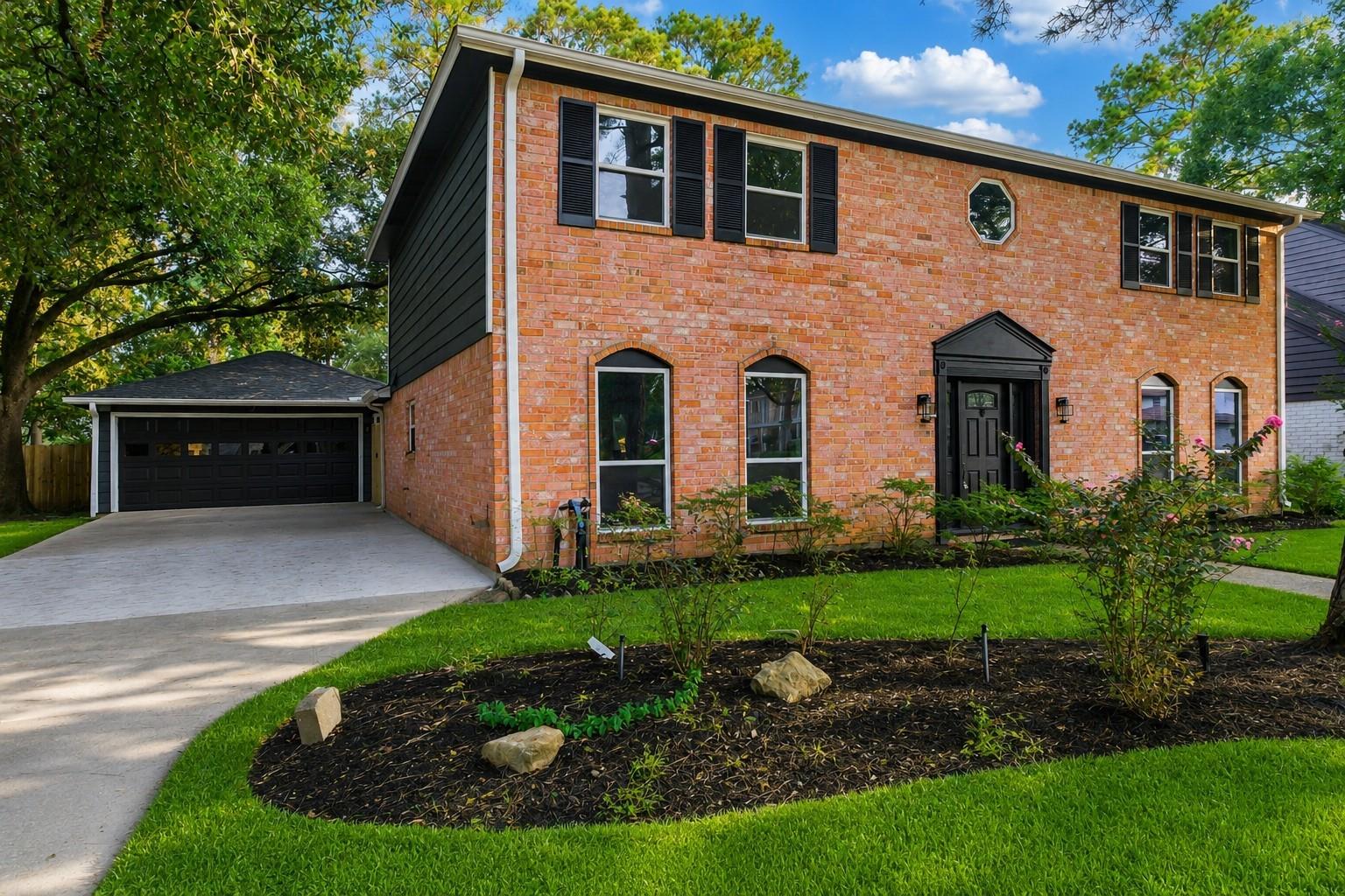 This stunning home is situated in tree lined Cypresswood - lovely subdivision.