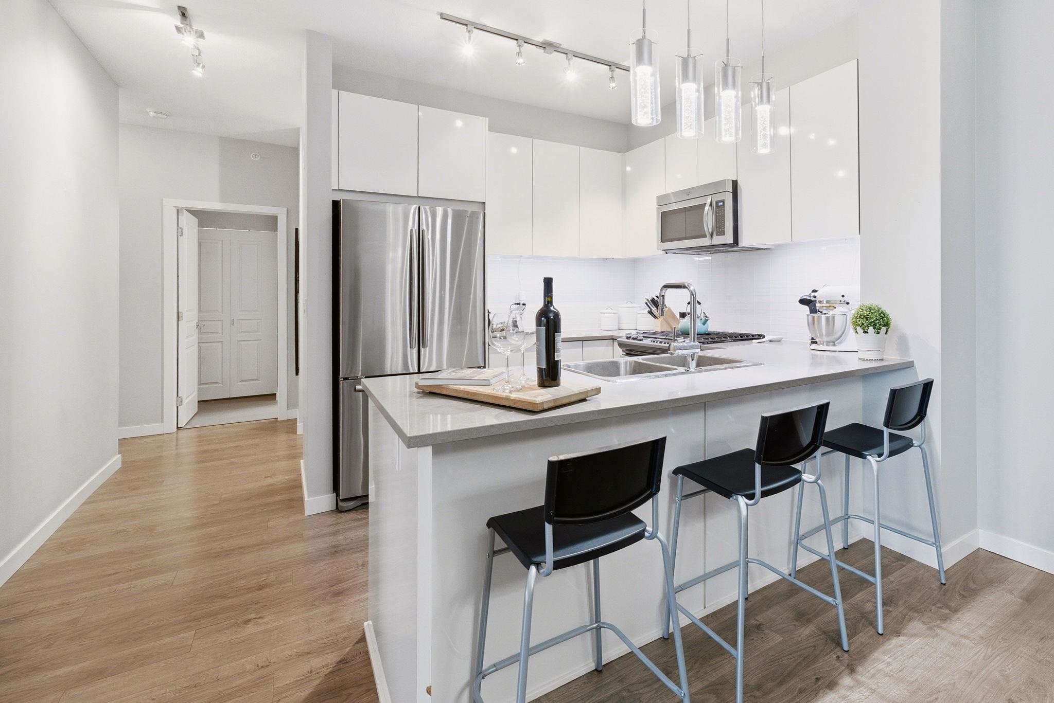 #512 1152 Windsor Mews - 9